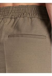 Herskind Spodnie materiałowe Pinky 4567878 Brązowy Loose Fit. Kolor: brązowy. Materiał: syntetyk