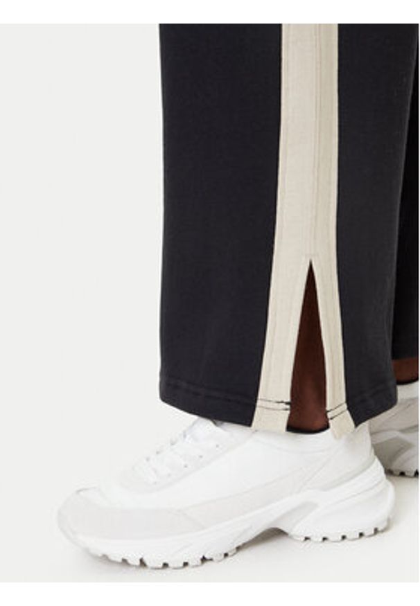 RVCA Spodnie dresowe Benchwarmer 23WS113505 Czarny Relaxed Fit. Kolor: czarny. Materiał: bawełna