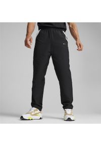 Spodnie dresowe tkane Puma AMG. Kolor: czarny. Materiał: dresówka
