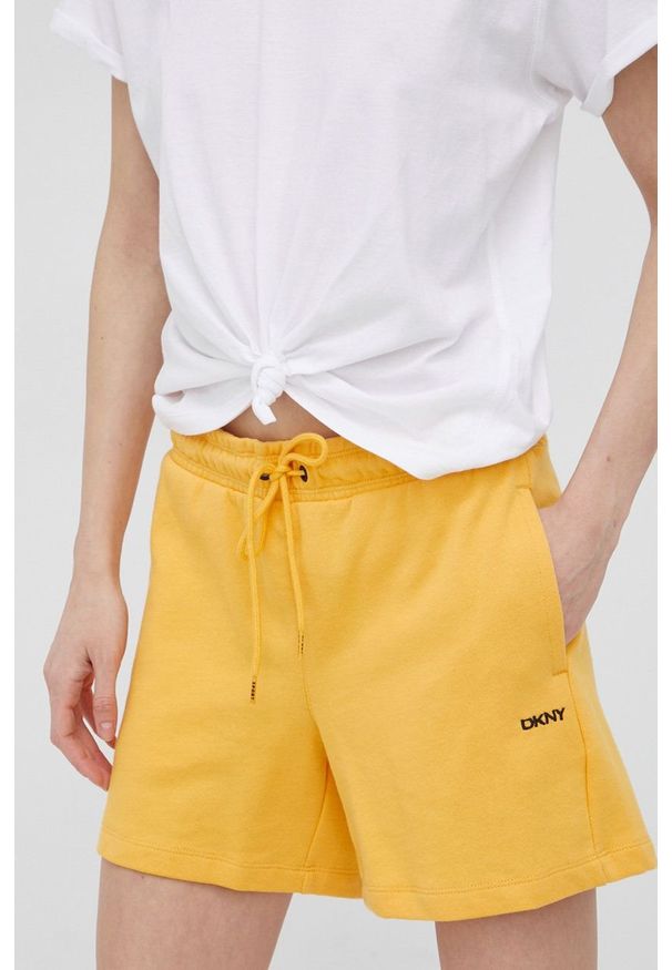 DKNY - Dkny szorty bawełniane damskie kolor żółty gładkie medium waist. Kolor: żółty. Materiał: bawełna. Wzór: gładki