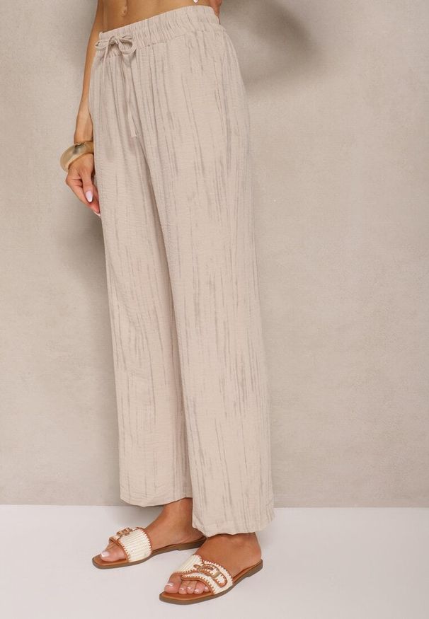 Renee - Beżowe Spodnie High Waist ze Sznurkiem Savurelle. Okazja: na co dzień. Stan: podwyższony. Kolor: beżowy. Wzór: aplikacja. Styl: sportowy, casual