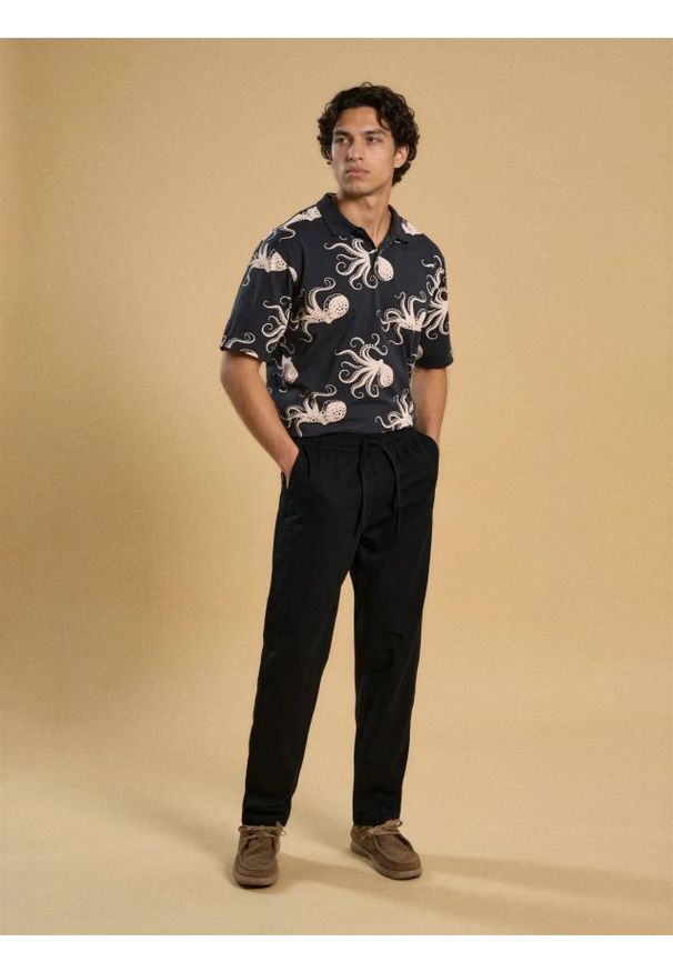 Sinsay - Spodnie chino jogger - czarny. Kolor: czarny