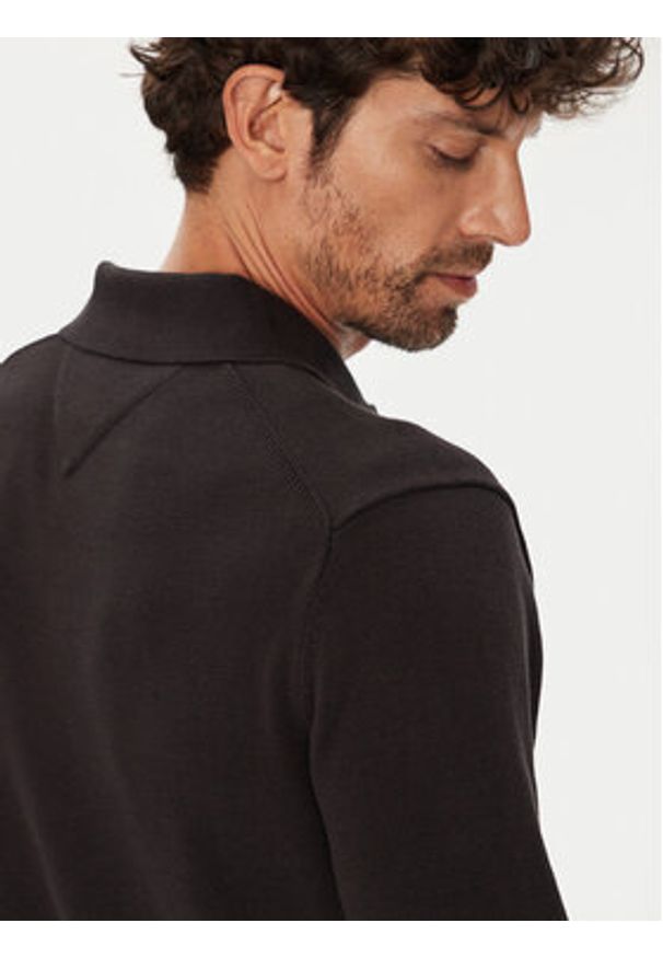 Tommy Jeans Sweter Essential DM0DM20304 Czarny Slim Fit. Kolor: czarny. Materiał: bawełna