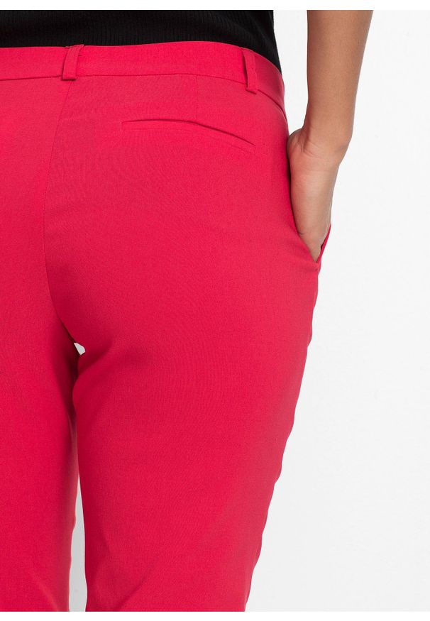 bonprix - Spodnie ze stretchem. Kolor: czerwony. Styl: elegancki