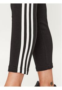 Adidas - adidas Spodnie dresowe Essentials 3-Stripes IC6126 Czarny Slim Fit. Kolor: czarny. Materiał: bawełna