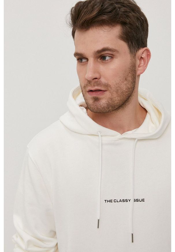 The Classy Issue Bluza kolor kremowy z kapturem z nadrukiem. Okazja: na co dzień. Typ kołnierza: kaptur. Kolor: beżowy. Wzór: nadruk. Styl: casual