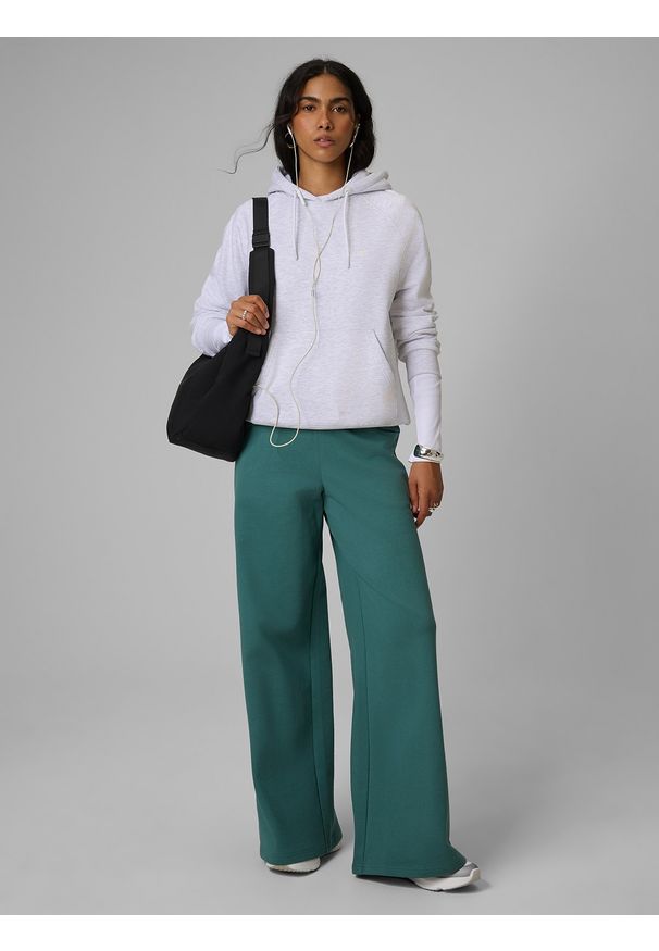 4f - 4F Spodnie dresowe z szerokimi nogawkami damskie - turkusowe XS. Kolor: turkusowy. Materiał: dresówka. Sport: bieganie, turystyka piesza