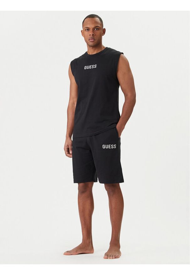 Guess Piżama U6GX02 KCAM1 Czarny Regular Fit. Kolor: czarny. Materiał: bawełna