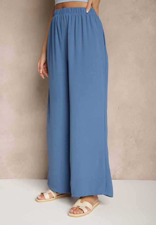 Renee - Niebieskie Szerokie Spodnie Typu Palazzo High Waist Araneira. Okazja: na spotkanie biznesowe, na co dzień, na spacer. Stan: podwyższony. Kolor: niebieski. Styl: casual, elegancki, biznesowy
