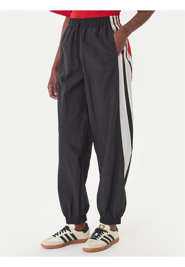 Adidas - adidas Spodnie dresowe Sport Santiago KC9116 Czarny Loose Fit. Kolor: czarny. Materiał: syntetyk