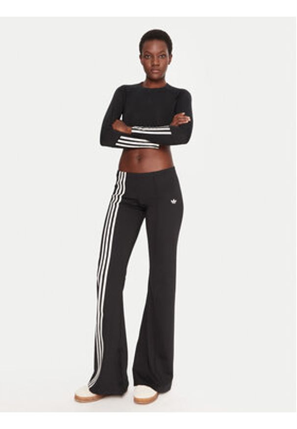 Adidas - adidas Legginsy Ribbon Off Placed 3-Stripes JX2697 Czarny Flared Fit. Kolor: czarny. Materiał: syntetyk