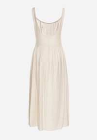 Born2be - Beżowa Wiskozowa Sukienka o Rozkloszowanym Kroju Milareina. Okazja: na co dzień. Kolor: beżowy. Materiał: wiskoza. Długość rękawa: długi rękaw. Wzór: aplikacja. Typ sukienki: rozkloszowane. Styl: casual, elegancki #6