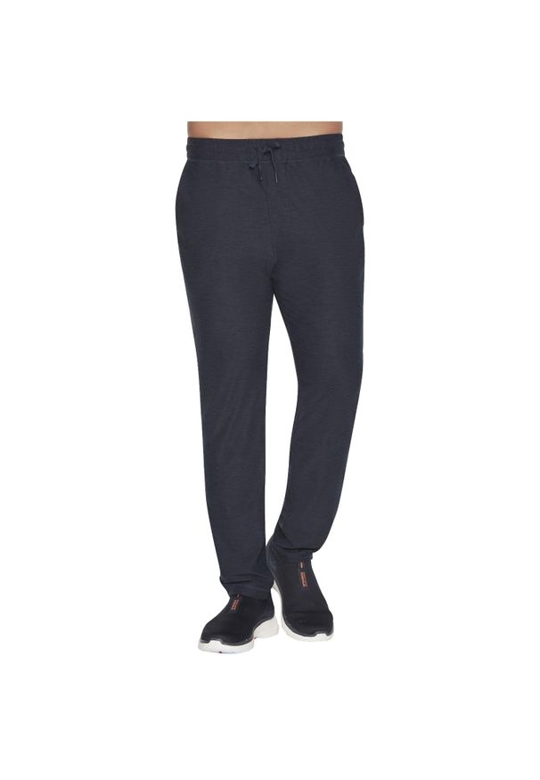 skechers - Spodnie sportowe męskie Skechers Ultra Go Lite Tapered Pant. Kolor: niebieski. Materiał: poliester, elastan