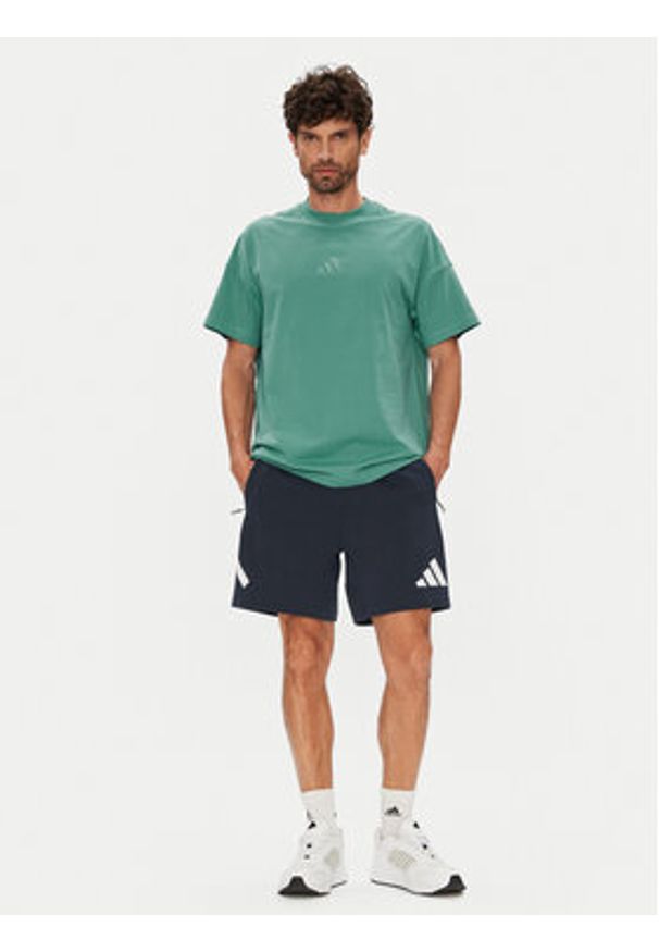 Adidas - adidas T-Shirt ALL SZN JX5085 Turkusowy Loose Fit. Kolor: turkusowy. Materiał: bawełna