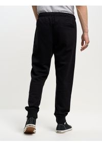 Big-Star - Spodnie męskie dresowe Pylyp 906. Kolor: czarny. Materiał: dresówka