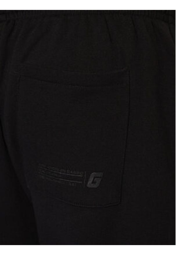 Guess Spodnie dresowe Z4YB00 KAIJ1 Czarny Relaxed Fit. Kolor: czarny. Materiał: bawełna