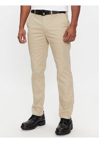 Calvin Klein Chinosy Modern K10K110979 Beżowy Slim Fit. Kolor: beżowy. Materiał: bawełna