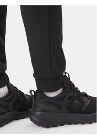 Adidas - adidas Spodnie dresowe Essentials Feel Cozy JE3854 Czarny Regular Fit. Kolor: czarny. Materiał: syntetyk, bawełna #5