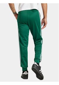 Adidas - adidas Spodnie dresowe adicolor Classics SST IR9886 Zielony Slim Fit. Kolor: zielony. Materiał: bawełna, syntetyk #3