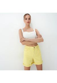 Mohito - Jeansowe szorty Eco Aware - Żółty. Kolor: żółty. Materiał: jeans