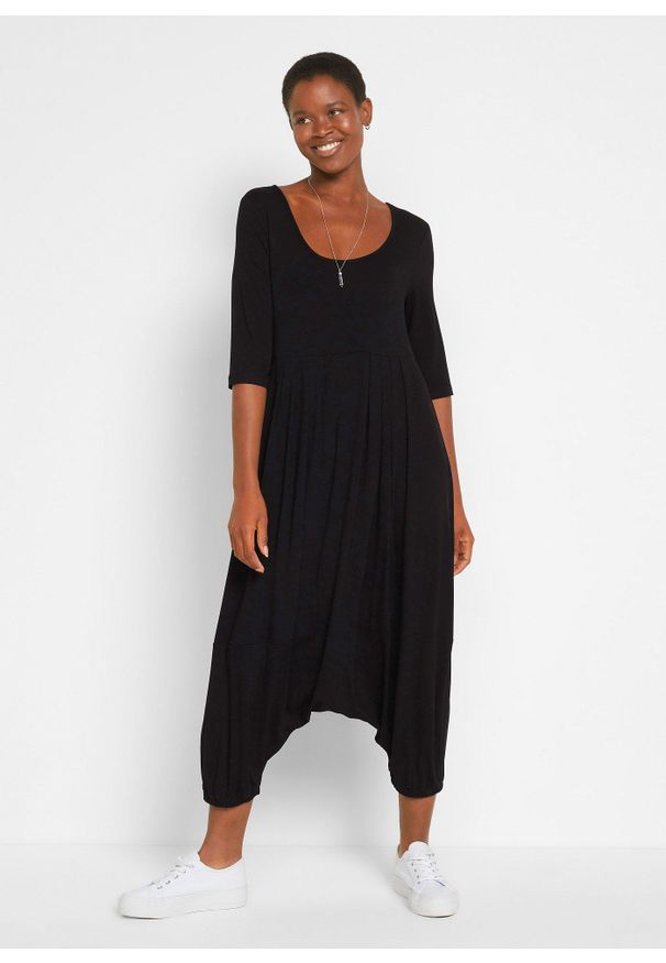 bonprix - Kombinezon z dżerseju z lejącej mieszanki wiskozy. Kolor: czarny. Materiał: jersey, wiskoza