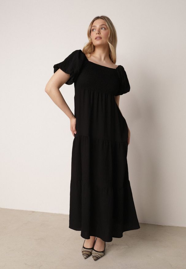 Born2be - Czarna Wiskozowa Sukienka z Bufiastymi Rękawami i Marszczoną Górą Liones. Okazja: na co dzień. Kolor: czarny. Materiał: wiskoza. Długość rękawa: krótki rękaw. Sezon: lato. Typ sukienki: proste. Styl: wakacyjny, casual