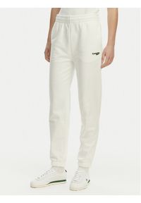Lacoste Spodnie dresowe XF7604 Biały Regular Fit. Kolor: biały. Materiał: bawełna #1