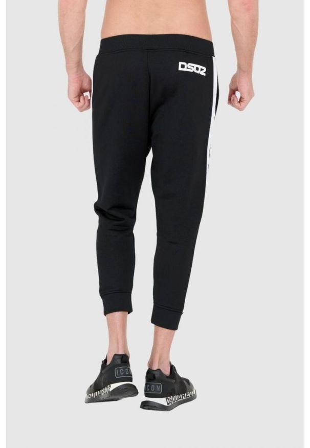 DSQUARED2 Czarne męskie dresy z białymi lampasami, Rozmiar S. Kolor: czarny. Materiał: bawełna, dresówka