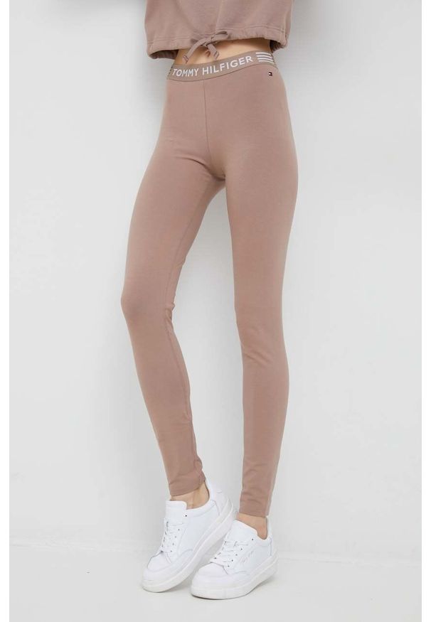 TOMMY HILFIGER - Tommy Hilfiger legginsy damskie kolor beżowy gładkie. Kolor: beżowy. Materiał: dzianina. Wzór: gładki