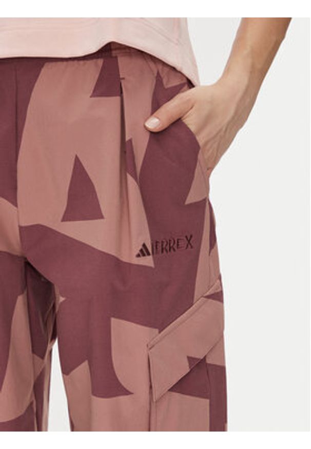 Adidas - adidas Spodnie outdoor Terrex Xploric Cargo JE9430 Różowy Loose Fit. Kolor: różowy. Materiał: syntetyk. Sport: outdoor