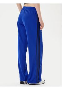 Adidas - adidas Spodnie dresowe adicolor Classic Firebird JY2693 Niebieski Loose Fit. Kolor: niebieski. Materiał: syntetyk #4