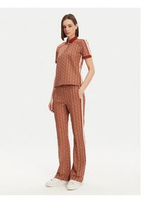 Lacoste Spodnie dresowe XF9313 Pomarańczowy Regular Fit. Kolor: pomarańczowy. Materiał: syntetyk, bawełna #4