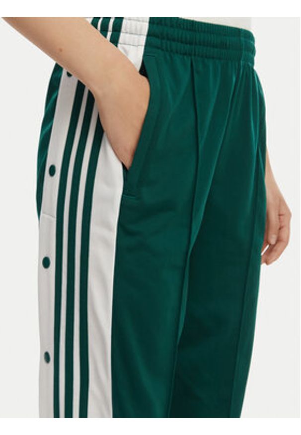 Adidas - adidas Spodnie dresowe Adibreak KD6327 Zielony Loose Fit. Kolor: zielony. Materiał: syntetyk