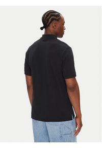 Nike Polo FN3894 Czarny Regular Fit. Typ kołnierza: polo. Kolor: czarny. Materiał: bawełna