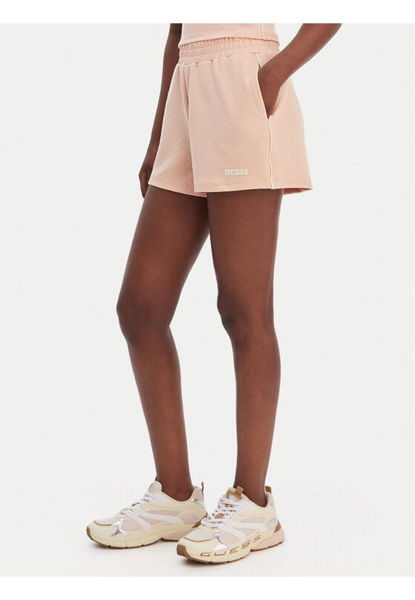 Guess Szorty sportowe V6GD08 K3004 Pomarańczowy Relaxed Fit. Kolor: pomarańczowy. Materiał: syntetyk
