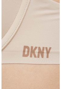 DKNY - Dkny biustonosz kolor beżowy gładki. Kolor: beżowy. Rodzaj stanika: wyciągane miseczki, biustonosz z fiszbinami, odpinane ramiączka. Wzór: gładki #4