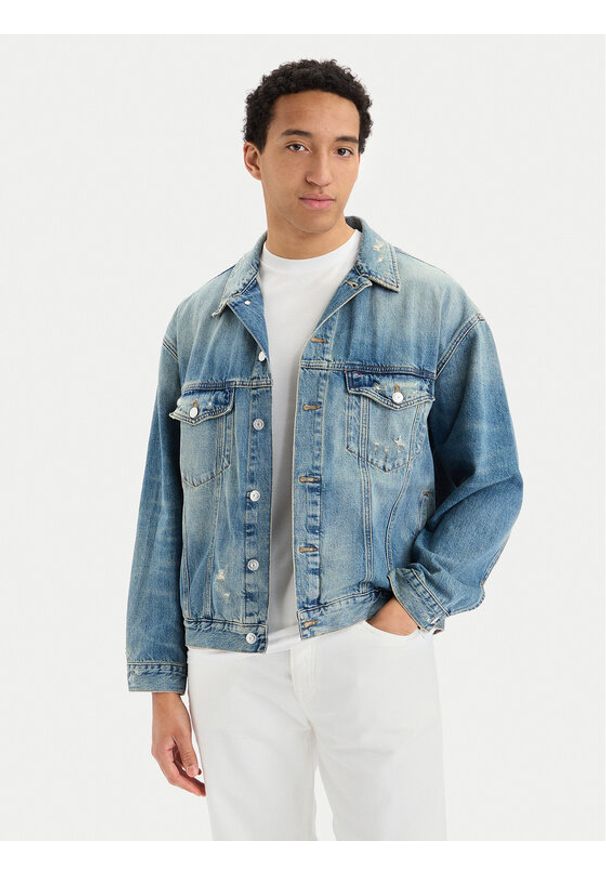 Tommy Jeans Kurtka jeansowa DM0DM22472 Niebieski Regular Fit. Kolor: niebieski. Materiał: bawełna