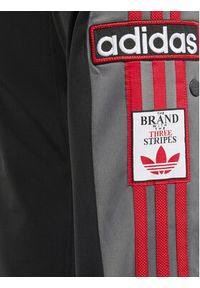Adidas - adidas Spodnie dresowe Adibreak IM8432 Czarny Regular Fit. Kolor: czarny. Materiał: syntetyk
