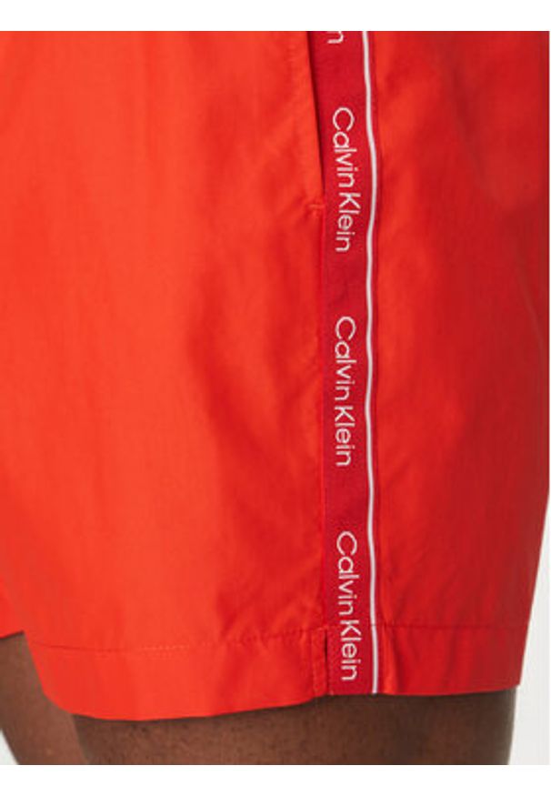 Calvin Klein Swimwear Szorty kąpielowe KM0KM01109 Czerwony Regular Fit. Kolor: czerwony. Materiał: syntetyk