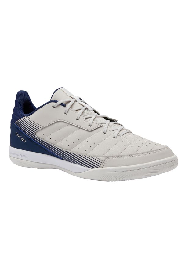 KIPSTA - Buty do piłki nożnej halowej dla dzieci Kipsta Escudo 500. Kolor: wielokolorowy, beżowy, niebieski. Materiał: kauczuk, materiał. Wzór: gładki