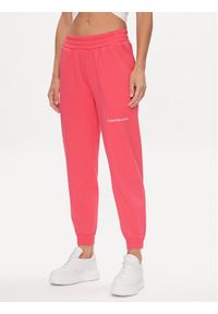 Calvin Klein Jeans Spodnie dresowe J20J220675 Różowy Relaxed Fit. Kolor: różowy. Materiał: syntetyk