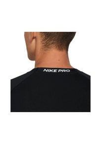 Koszulka treningowa męska Nike Pro Drifit. Kolor: wielokolorowy, czarny, biały. Długość rękawa: krótki rękaw. Długość: krótkie