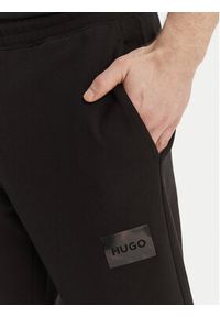 Hugo - HUGO Spodnie dresowe Daylony 50557453 Czarny Regular Fit. Kolor: czarny. Materiał: bawełna #4