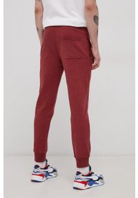 Superdry Spodnie męskie kolor bordowy gładkie. Kolor: czerwony. Materiał: dzianina. Wzór: gładki #2