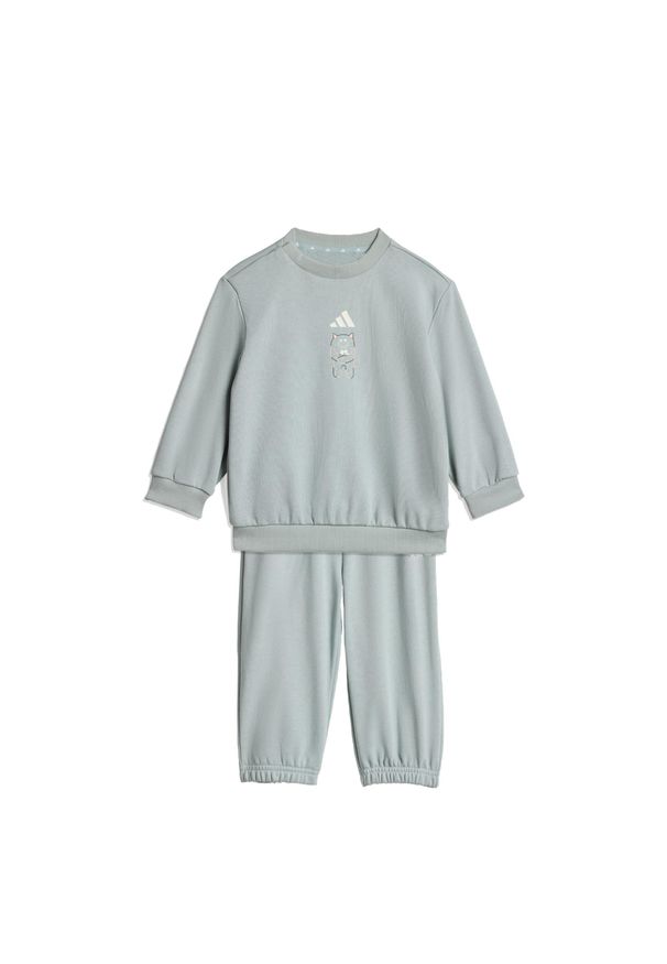 Adidas - Zestaw Tiro_Nster Jogger. Okazja: na uczelnię, na co dzień. Kolor: zielony, biały, wielokolorowy. Materiał: dresówka. Wzór: nadruk. Styl: casual, sportowy