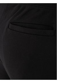 TOMMY HILFIGER - Tommy Hilfiger Spodnie dresowe Global Stripe MW0MW42882 Czarny Regular Fit. Kolor: czarny. Materiał: bawełna #3