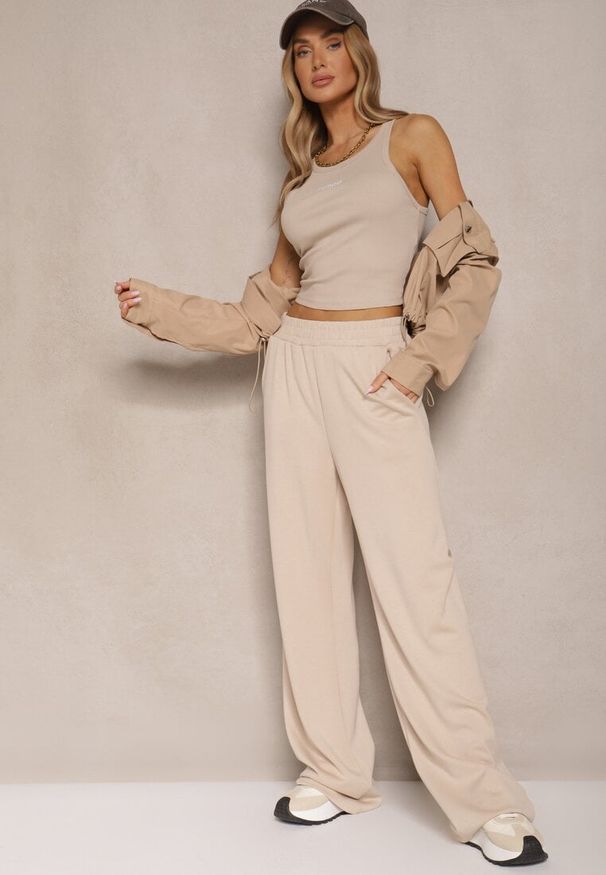 Renee - Beżowe Spodnie o Szerokim Kroju High Waist z Gumką w Pasie Belobira. Okazja: na co dzień. Stan: podwyższony. Kolor: beżowy. Długość: długie. Styl: casual, elegancki, wizytowy