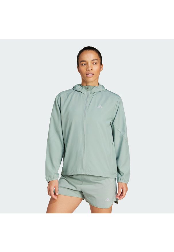 Adidas - Kurtka Run It. Kolor: zielony. Materiał: materiał. Sport: bieganie