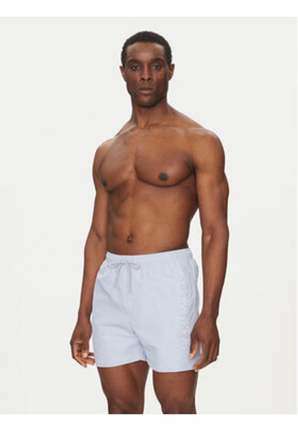 Calvin Klein Swimwear Szorty kąpielowe KM0KM01166 Niebieski Regular Fit. Kolor: niebieski. Materiał: syntetyk