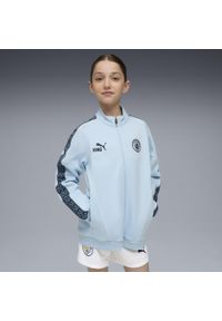 Puma - Młodzieżowa kurtka Manchester City KING Anthem PUMA Silver Sky Deep Navy Blue. Kolor: niebieski. Sport: bieganie